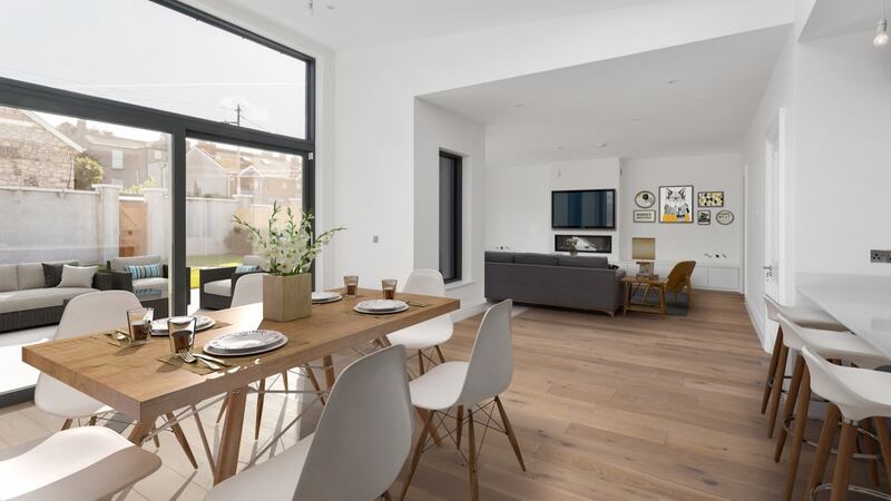 Living/dining room,  virtually staged.