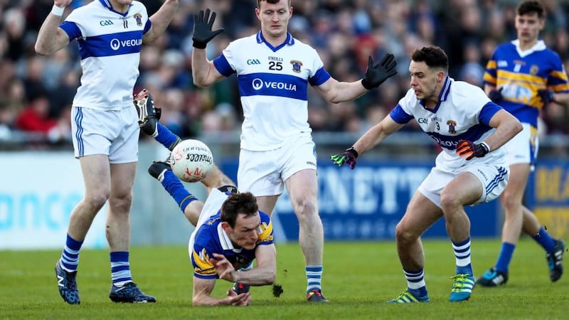 James Sherry of Castleknock is crowded out at Parnell Park. Photo: Tommy Dickson/Inpho