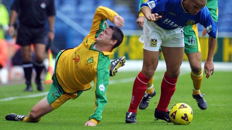 Nigel Quasie  goes around Philip Mulryne  during the Nationwide Division One match at Fratton Park, Portsmouth in December 2001: Photograph: Craig Prentis/ALLSPORT/Getty Images