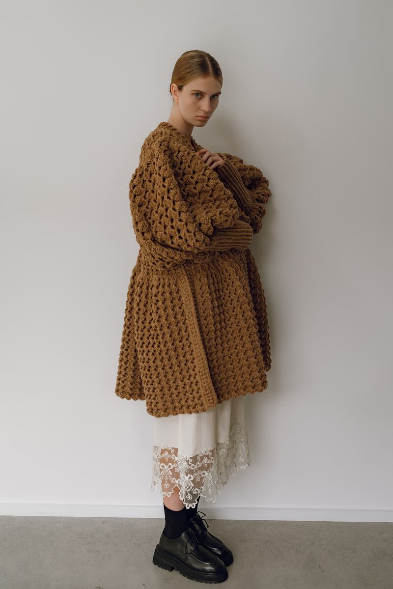 Hand crochet coat in camel €1,950 Colin Burke, cream slip dress €445 Simone Rocha, shoes by Marsell €695 Havana boutique. Photographer: Tetyana Maryshko