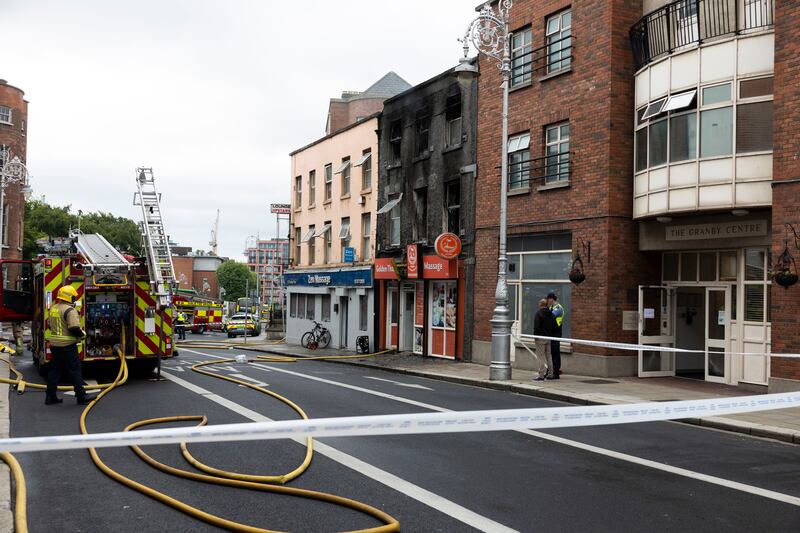 Dublin Fire Brigade and gardaí at the scene of the fire on Granby Row, Dublin 1. Photograph: Sam Boal/Collins Photos 