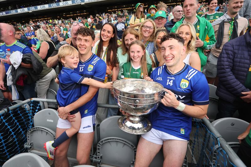 Paudie Clifford and his brother David celebrate with family and friends at Croke Park. Photograph: Bryan Keane/Inpho