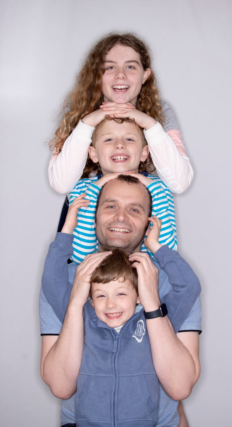 Clive Bowers with his children Hannah (11), Jacob (9) and Finn (6). Photograph: Tom Honan 