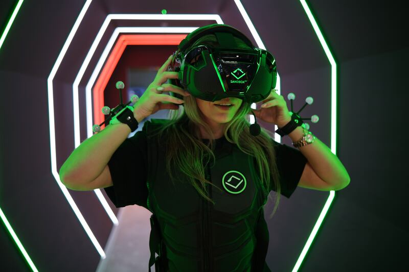 Stephanie Hogg, head of business development, Sandbox VR UK & Ireland, displays the player’s kit on a tour of the Sandbox virtual reality gaming experience on Nassau Street. Photograph: Chris Maddaloni