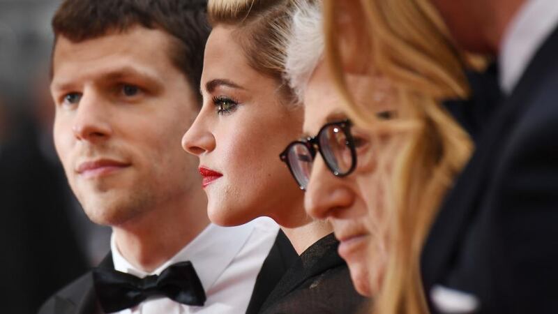 Jesse Eisenberg: “He’s changed my life more than any other creative inspiration,” the actor says of Woody Allen (right, with Eisenberg and Kristen Stewart in Cannes with their film Cafe Society. Photograph: Anne-Christine Poujoulat/AFP/Getty