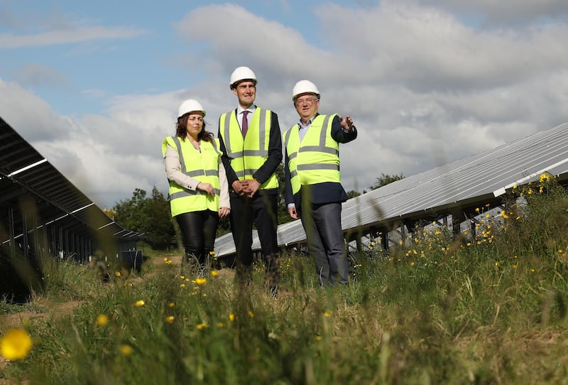 Andrea Carroll,group head of environmental sustainability, DAA, Jack Chambers TD, Minister of State for Transport and Vincent Harrison, chief commercial and development officer, DAA, pictured at the announcement of a new solar farm under construction at Dublin Airport. Photograph: Robbie Reynolds