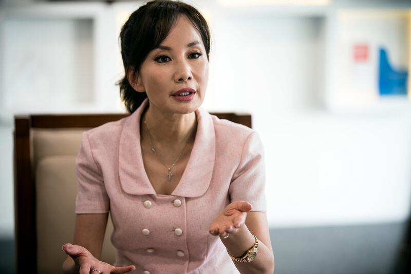 Jane Sun, chief executive of the online travel company Ctrip, which offers financial support to employees who have children or are considering it.