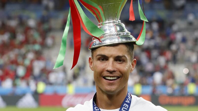 Ronaldo with the trophy after Portugal won Euro 2016. Photo: VI Images via Getty Images