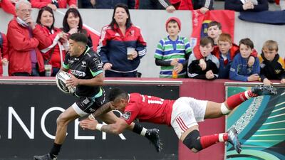 Ospreys’ Keelan Giles is denied a late try by Munster’s Francis Saili at Saturday’s Guinness Pro12 semi-final at Thomond Park, Limerick. Photograph: Morgan Treacy/Inpho