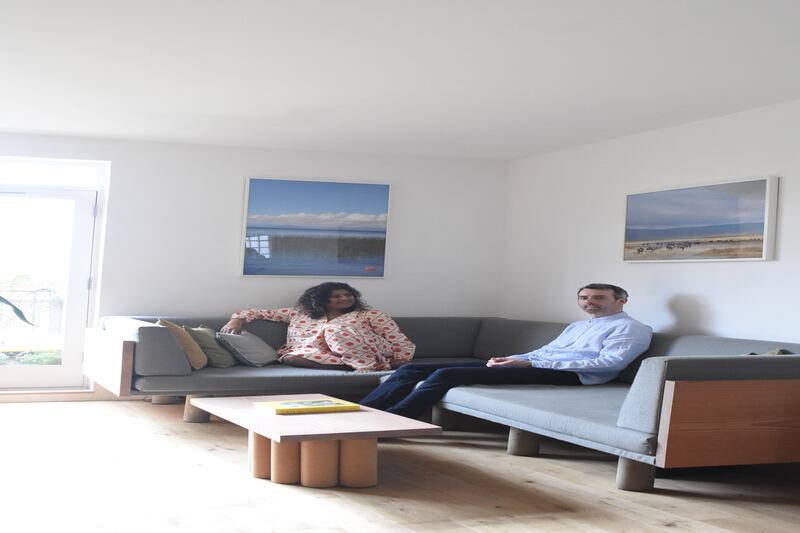 Jewlsy Mathews and Mike McMahon at home on the sofa they made, casting the legs in concrete in the courtyard. Photograph: Mike McMahon Studios