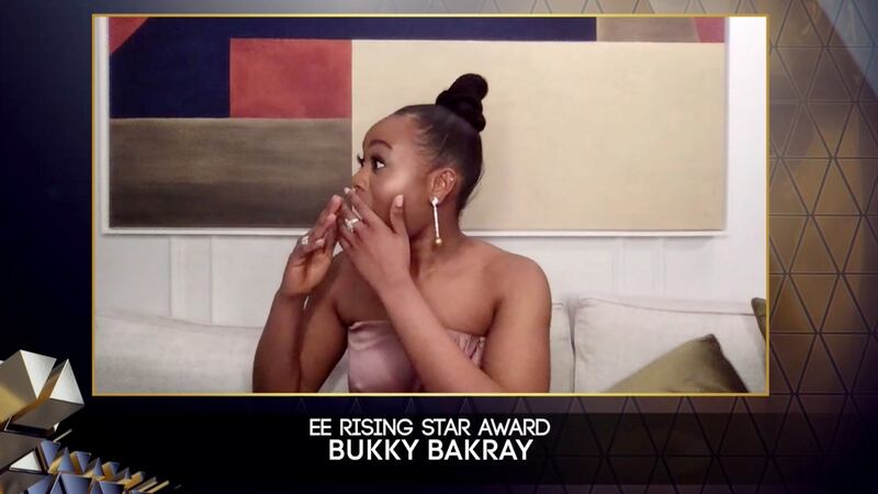 Bukky Bakray accepting the EE Rising Star Bafta