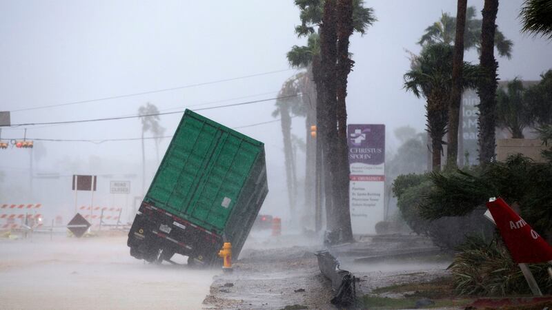 A power generator tips in  Corpus Christi Texas, as Hurricane Harvey hits land Friday. Photograph: Courtney Sacco /Corpus Christi Caller-Times via AP