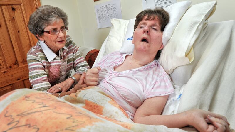 Mary McDonnell and her daughter Sinéad: “We love our daughter and are happy for her to be with us at home but, as carers, we are a community that has been taken for granted by the Government.”  Photograph: Daragh Mc  Sweeney/Provision