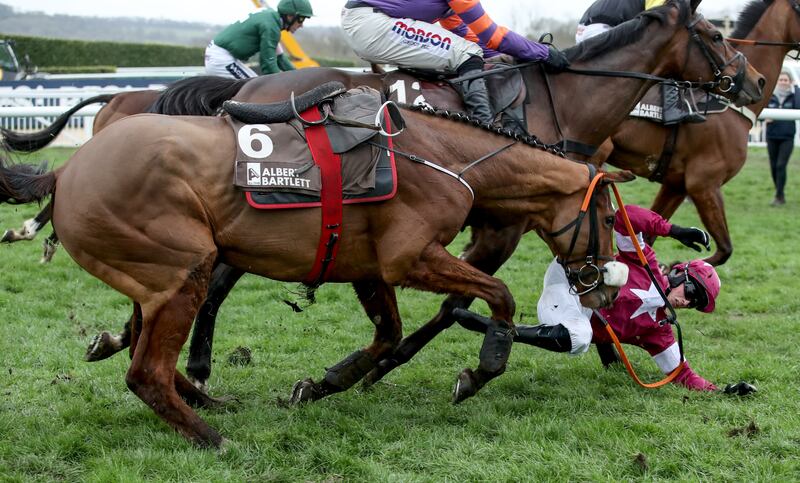 Bryan Cooper comes off Death Duty in the Albert Bartlee Novices' Hurdle at Cheltenham in 2017. Jockeys fall, on average, once in every 15 rides. Photograph: Dan Sheridan/Inpho 