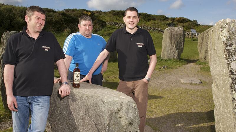 West Cork Distillers founder John O’Connell (right), with co-founders Denis and Ger McCarthy. Photograph: Neil Danton