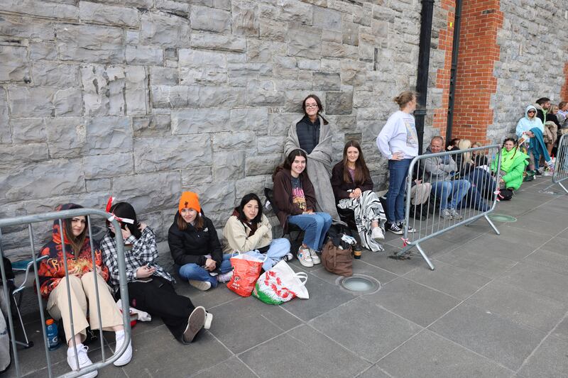 Fans queue for the first Billie Eilish concert at the 3Arena, Dublin.
Photograph: Dara Mac Dónaill / The Irish Times








