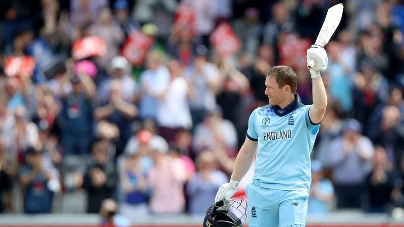 England’s Eoin Morgan raises his bat after reaching his century against Afghanistan. Photograph: Tim Goode/PA