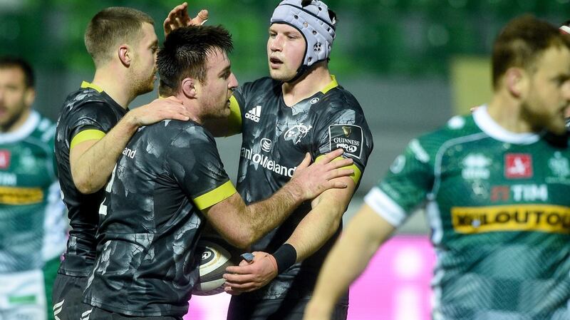 Munster’s Niall Scannell celebrates after scoring a try with Josh Wycherley during the Pro14 match against Benetton. Photo: Elena Barbini/Inpho