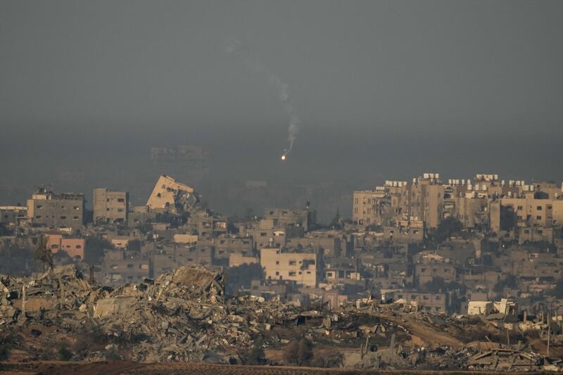 An Israeli army flare is seen over the Gaza Strip. Photograph: Leo Correa/AP