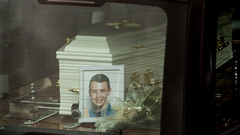 The hearse carries the remains of  Liam Hawe into  St Mary’s Church, Castlerahan, Co Cavan. Photograph: Dara Mac Dónaill/The Irish Times