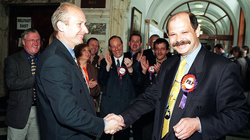 Progressive Unionist party leaders Billy Hutchinson and David Ervine celebrate with their supporters in Belfast city hall in 1998. Photograph: Paul Faith/Pacemaker