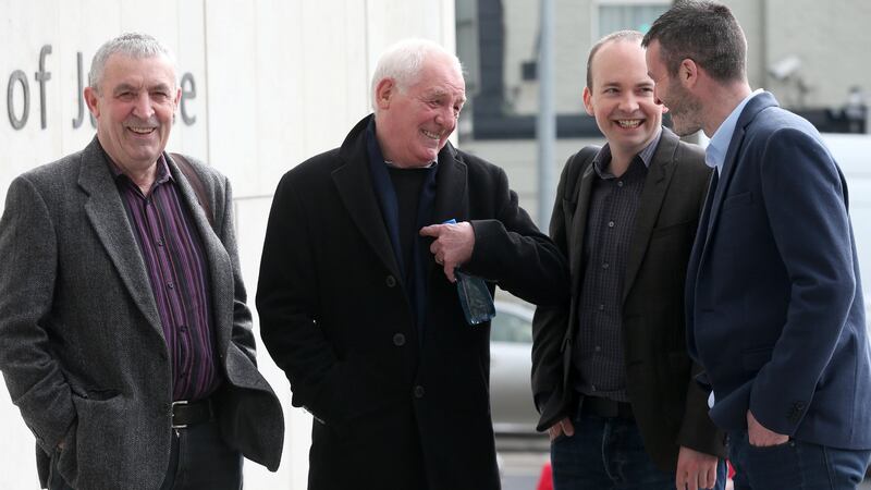 Broadcaster Eamon Dunphy (second left) pictured with defendants in the Jobstown trial (from left) Frank Donaghy, Paul Murphy TD and Scott Masterson outside the Dublin Circuit Criminal Court. Photograph: Collins