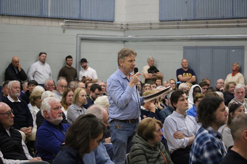 Seamus Doyle, a resident of Dublin 15, speaks to the public meeting about the effect of drones.   Photograph: Hugh Dooley