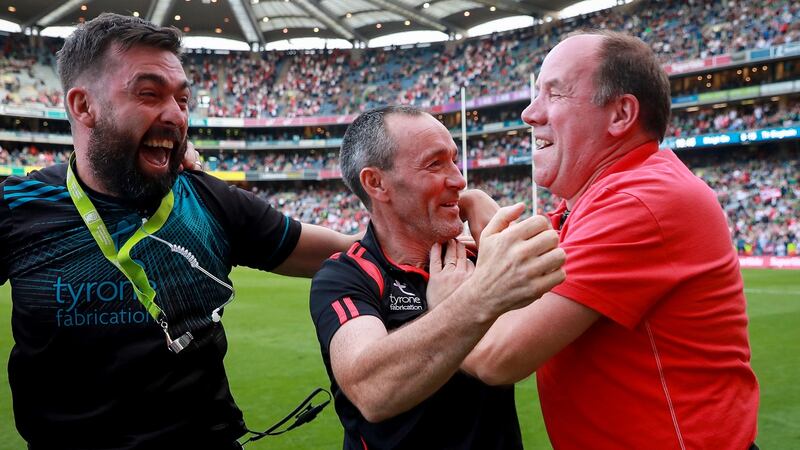 Tyrone joint managers Brian Dooher and Feargal Logan celebrate after the game. Photo: Tommy Dickson/Inpho