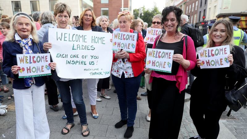 Members of the public wait outside the Mansion House in Dublin to greet survivors of the Magdalene laundries. Photograph:  Brian Lawless/PA Wire