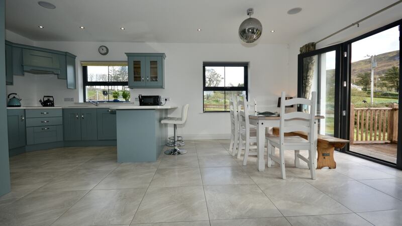 The 171sq m/1,840sq ft property has an open-plan kitchen-living area running the depth of the property.