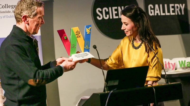 Trinity Walton Club director Prof Arlene Gallagher making a presentation to John Cronin of Castleknock Community College in recognition of his school’s participation in the Stem enhancement programme. Photograph: Sharppix