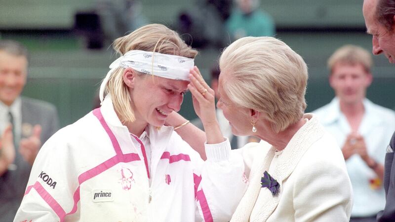 The Duchess of Kent comforts Jana Novotna as she presents her with the runner up trophy on centre court at Wimbledon. Photo: Adam Butler/PA Wire