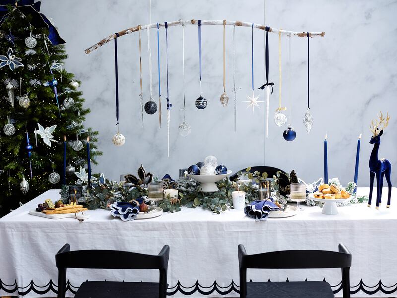 Icy shades of white, blue and silver with pops of dark navy ornaments add a touch of elegance, according to the Christmas shop at Brown Thomas