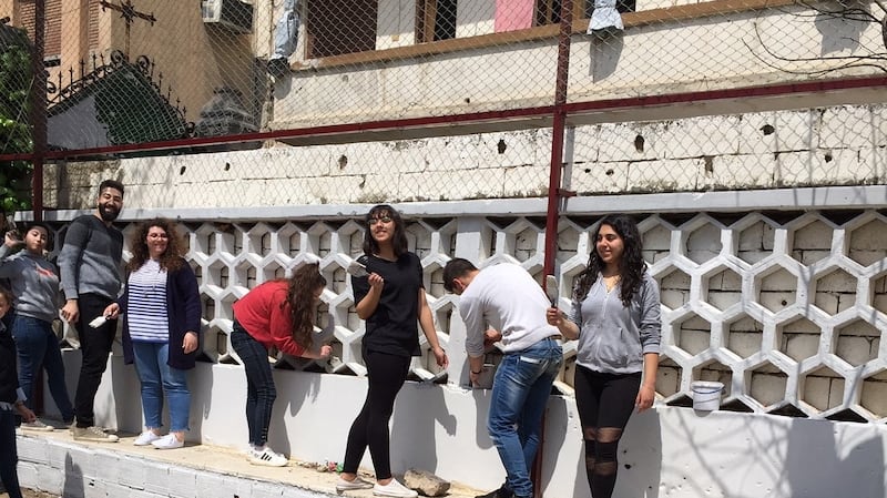 Young people in Homs preparing for the Mass and lunch to commemorate murdered Jesuit priest Fr Frans van der Lugt. Photograph: Michael Jansen