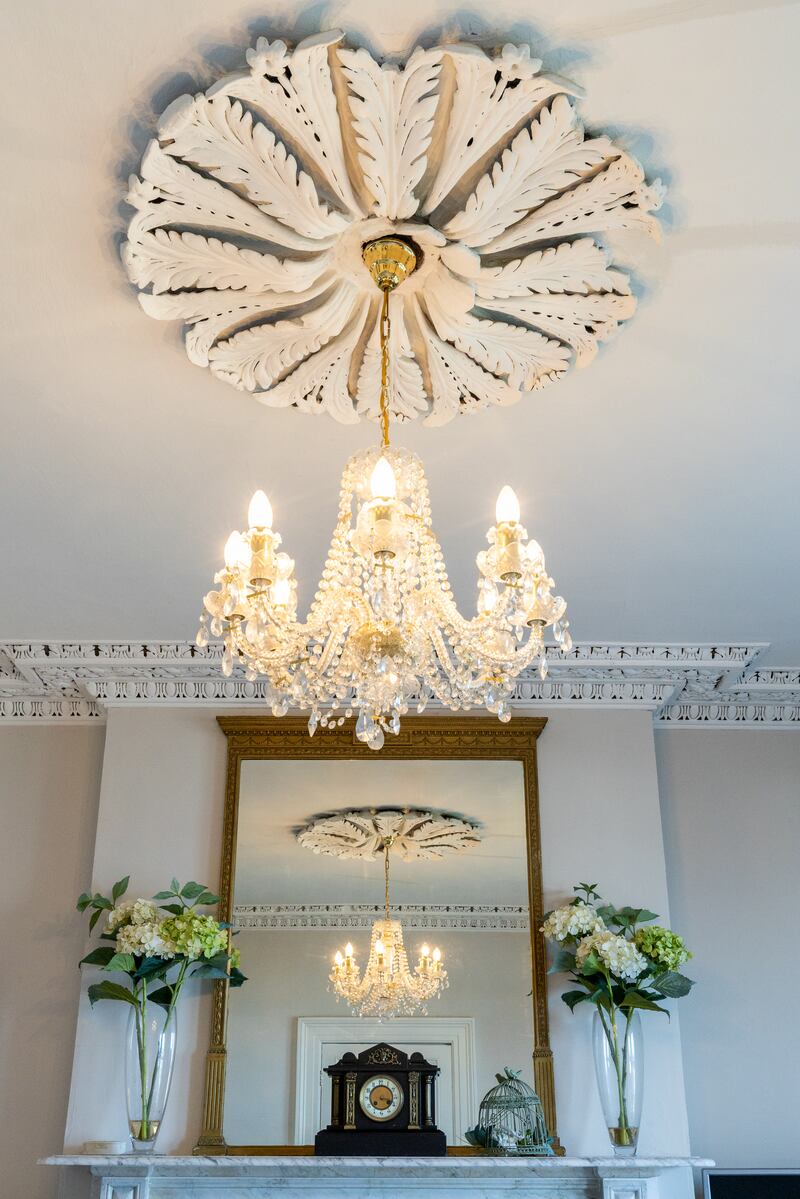 Ceiling roses and cornicing are all in good condition