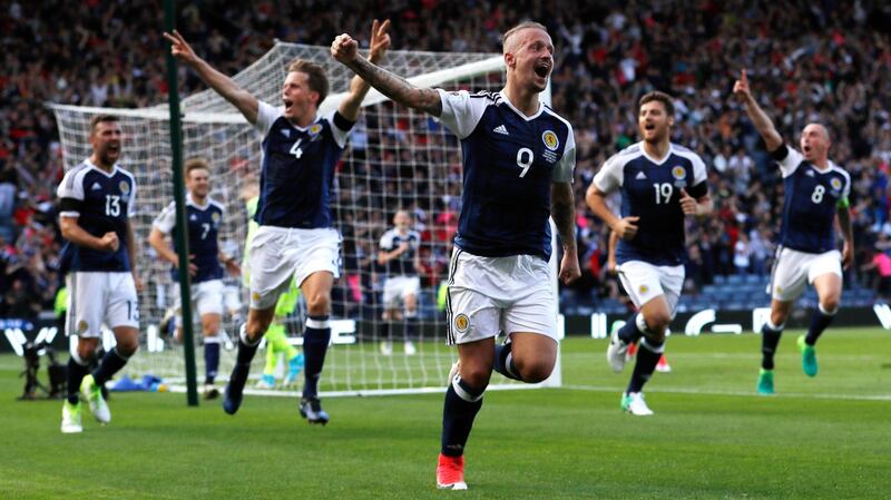 Scotland’s Leigh Griffiths celebrates scoring his second goal. Photograph: Lee Smith/Reuters