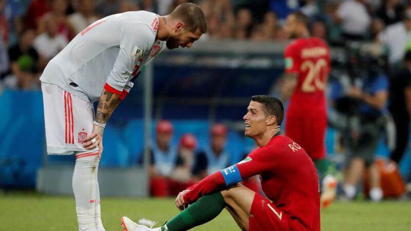 Spain’s Sergio Ramos talks to Portugal’s Cristiano Ronaldo during the World Cup Group B clash  at the Fisht Stadium in Sochi. Photograph: Carlos Barria/Reuters