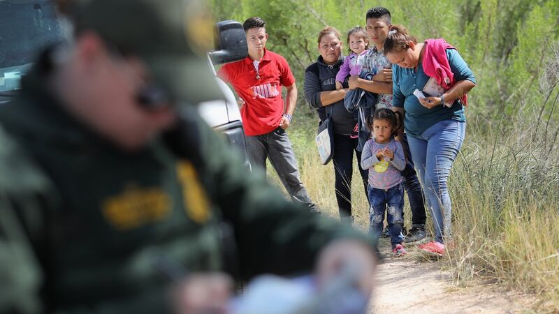 Central American asylum seekers wait as US.Border Patrol agents take groups of them into custody on June 12th. Photograph: John Moore/Getty Images