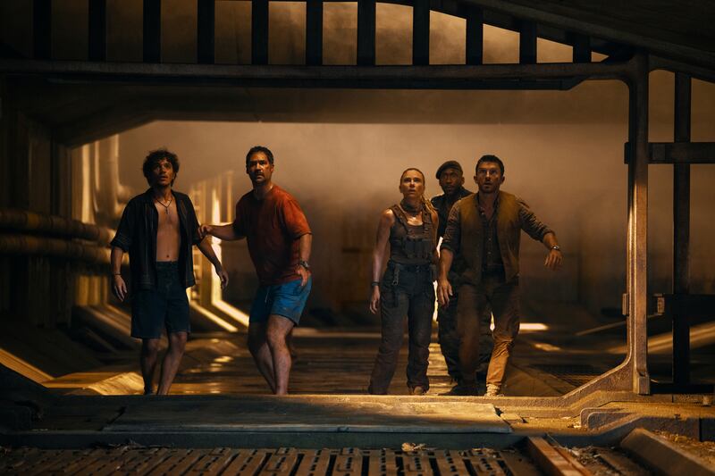 Undated film still from Jurassic World Rebirth. Pictured: David Iacono as Xavier Dobbs, Manuel Garcia-Rulfo as Reuben Delgado, Scarlett Johansson as Zora Bennett, Mahershala Ali as Duncan Kincaid and Jonathan Bailey as Dr Henry Loomis. See PA Feature SHOWBIZ Film Reviews. WARNING: This picture must only be used to accompany PA Feature SHOWBIZ Film Reviews. PA Photo. Picture credit should read: Universal Pictures and Amblin Entertainment/Jasin Boland. All Rights Reserved. NOTE TO EDITORS: This picture must only be used to accompany PA Feature SHOWBIZ Film Reviews.