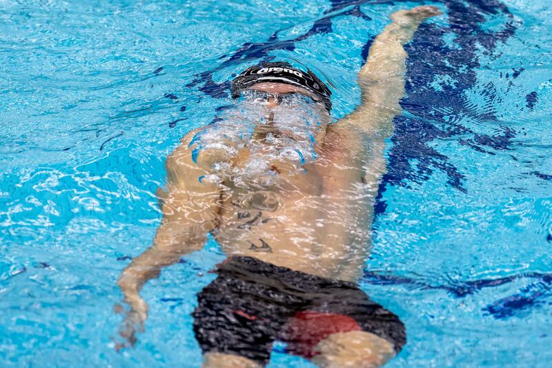 Conor Ferguson in action during the100m backstroke. Photograph: Morgan Treacy/Inpho