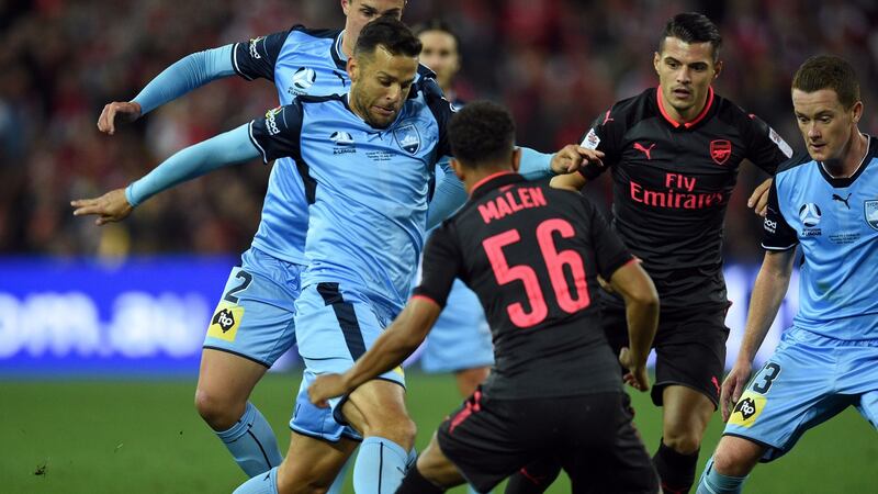 Sydney FC’s Brazilian striker  Bobo in action against Arsenal’s Donyell Malen during the recent friendly game in Sydney. Photograph: Saeed Khan/AFP/Getty Images
