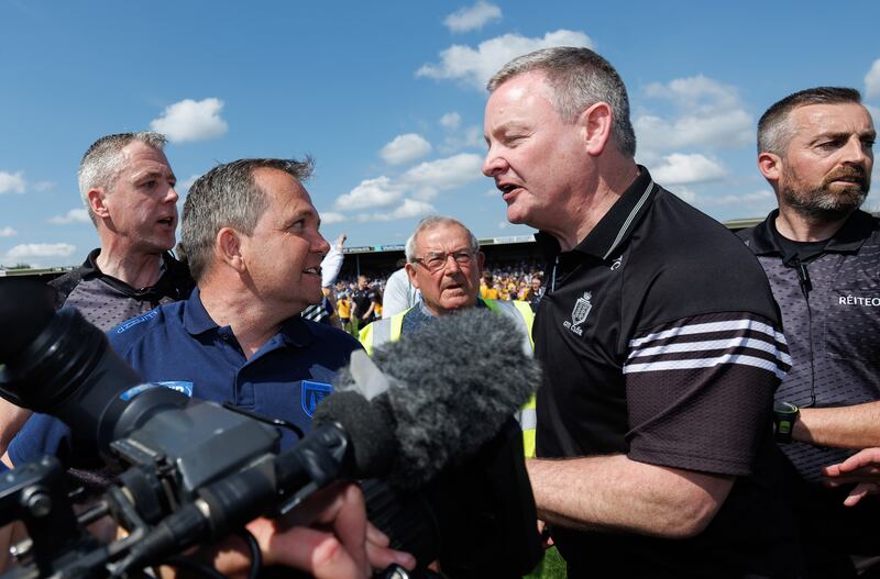 Waterford manager Davy Fitzgerald has words with Clare selector Tommy Corbett after the game. Photograph: James Crombie/Inpho