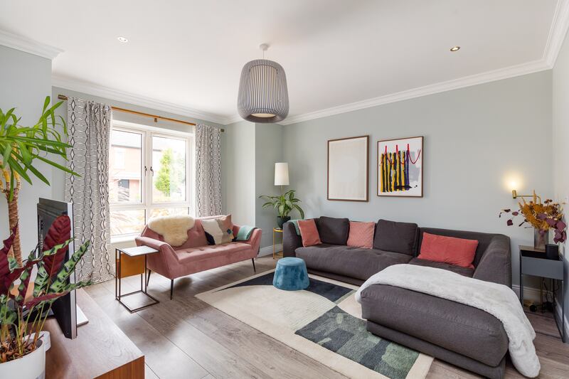 Inside the hardwood front door is a formal livingroom.