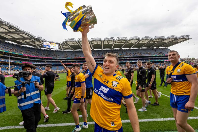 Shane O'Donnell with the Liam MacCarthy Cup. Photograph: Morgan Treacy/Inpho