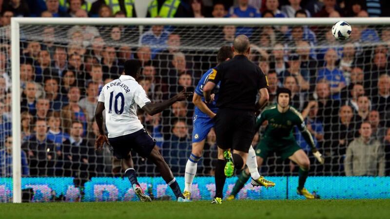 Tottenham Hotspur’s Emmanuel Adebayor (left) scores their first at Stamford Bridge. Photograph: Eddie Keogh/Reuters