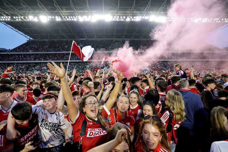 Young Cork fans celebrate after the victory over Limerick at Supervalu Páirc Uí Chaoimh. Photograph: Laszlo Geczo/Inpho 
