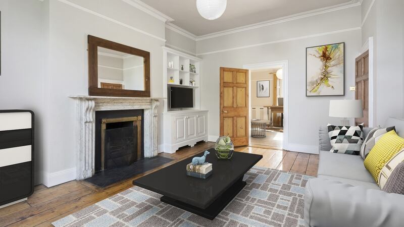 The interconnecting living rooms off the main hall