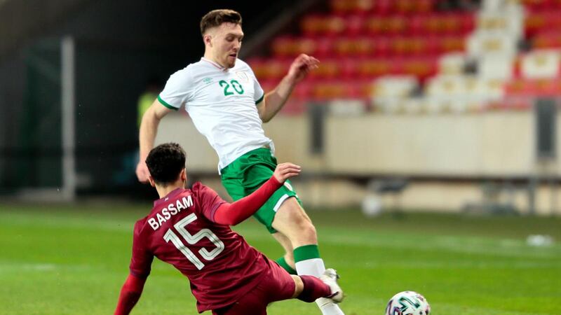 Qatar’s Bassam Al-Rawi challenges Dara O’Shea during the international friendly match in Hungary. Photograph:  Trenka Attila/PA Wire