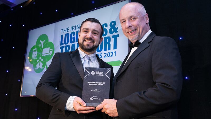 Adam Zurawski, Senior Recruiter at Driving Force Ireland (Recruitment & Training), presents the Logistics & Transport SME Company of the Year award to Brian Beattie, McCulla Ireland.