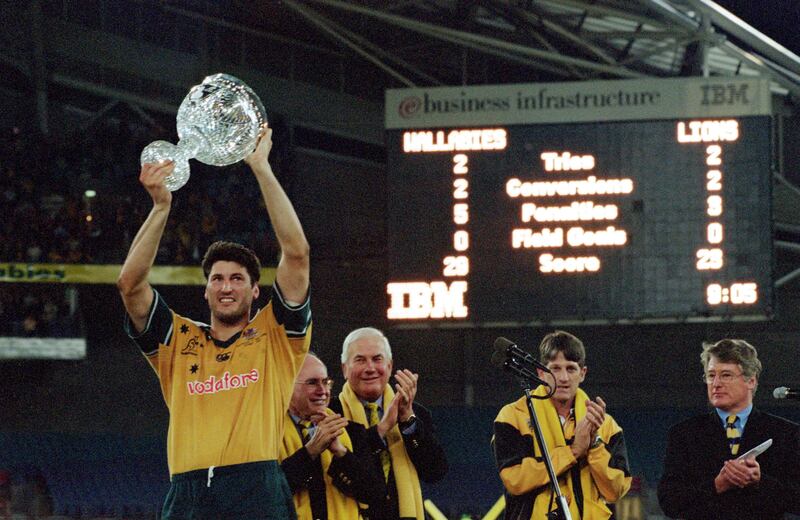 Australia captain John Eales lifts the Tom Richards Cup after the series victory against the Lions in 2001. Photograph: Scott Barbour/Allsport